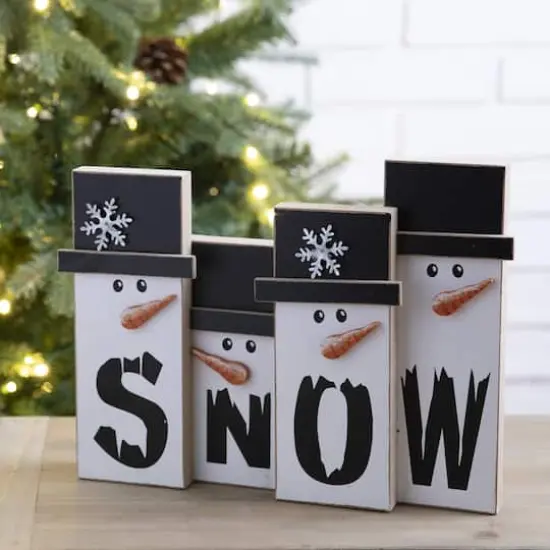 Glitzhome&reg; 12" Wooden Snowman Family Tabletop Accent {3}