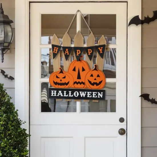 Glitzhome&reg; 14"H Halloween Wood Jack O Lantern Door Hanger {3}
