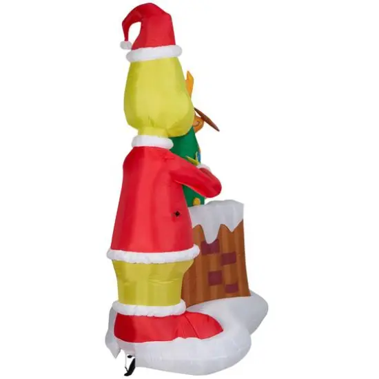 6.5ft. Animated Airblown&reg; Inflatable Christmas Grinch Pulling Tree from Chimney {6}