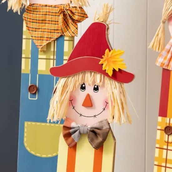 Glitzhome&reg; Fall Wood Sacrecrow Family Porch Decor Set {5}