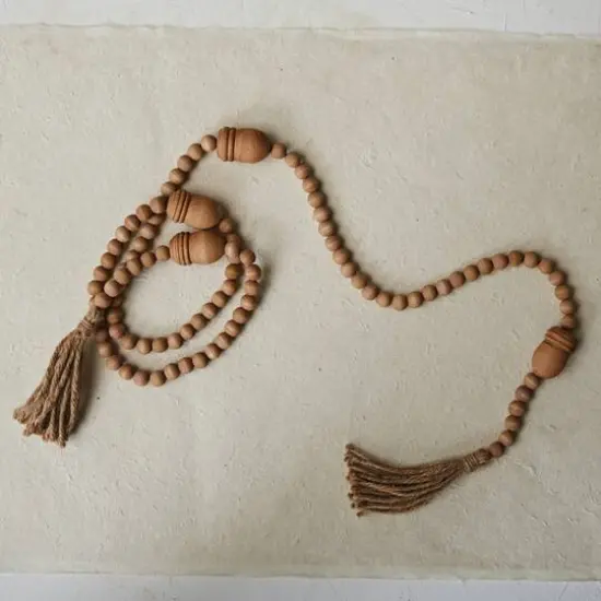 Hello Honey&reg; 6ft. Wood Beads & Acorns with Jute Tassels Garland {3}