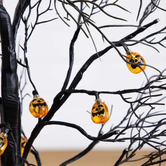 3ft. Pre-Lit Artificial Halloween Black Twig Tree with 18 Orange LED Pumpkin Shaped Lights {6}