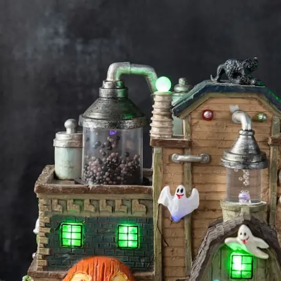 Glitzhome&reg; 11"H Lighted Resin Halloween Haunted House Village {6}
