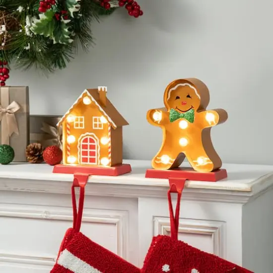 Glitzhome&reg; Marquee LED Gingerbread House & Gingerbread Man Christmas Stocking Holder Set {3}