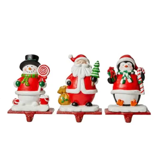 Glitzhome&reg; 7" Santa, Snowman & Penguin Stocking Holder Set {1}