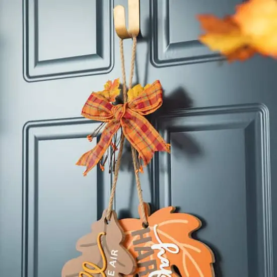 Glitzhome&reg; 24.5" Fall Wood Maple Leaves with Bowknot Door Hanger {5}
