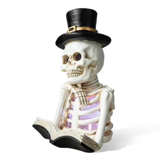 Glitzhome&reg; 10" Lighted Halloween Resin Skull Reading Book Table D&eacute;cor {1}