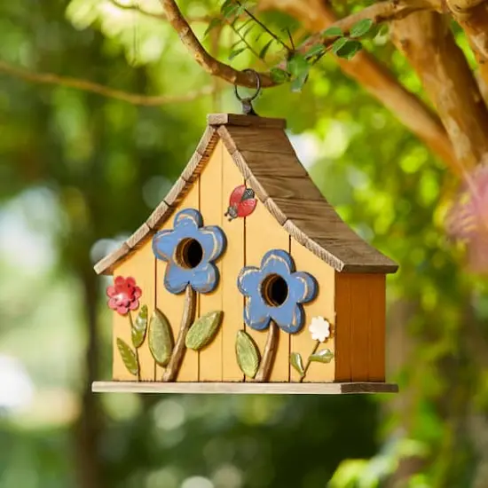Glitzhome&reg; 10.5" Yellow Distressed Wood Birdhouse with Flowers {3}