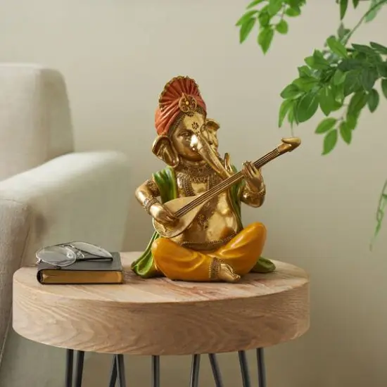 10.75" Gold Ganesh Musician Decorative Sculpture with Green, Yellow, and Red Accents {9}