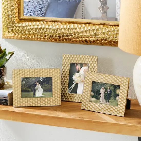 Glitzhome&reg; 3 Pack 4" x 6" Gold Honeycomb Resin Tabletop Picture Frames {3}