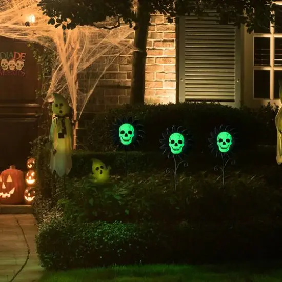 Glitzhome&reg; 24" Halloween Metal Sunflower Skulls Glow-in-Dark Yard Stakes, 3ct. {4}