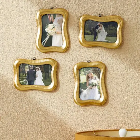 Glitzhome&reg; 4 Pack 4" x 6" Vintage Gold Resin Tabletop Picture Frames {4}