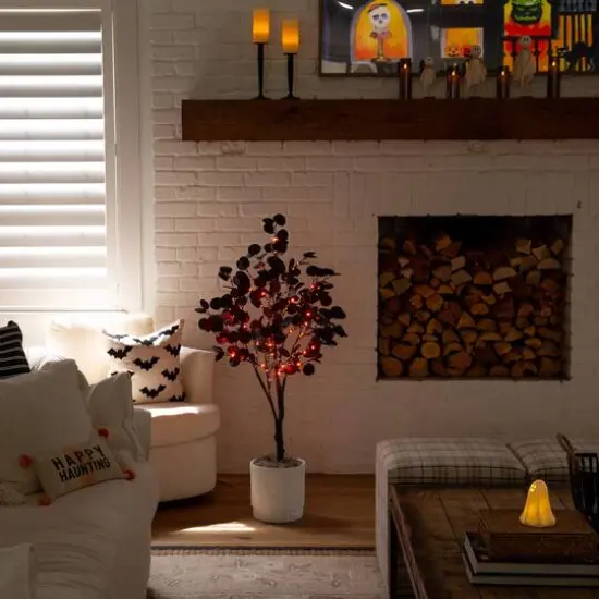 4ft. Pre-Lit Artificial Halloween Black Eucalyptus Tree with 160 Orange & Purple LED Lights {10}