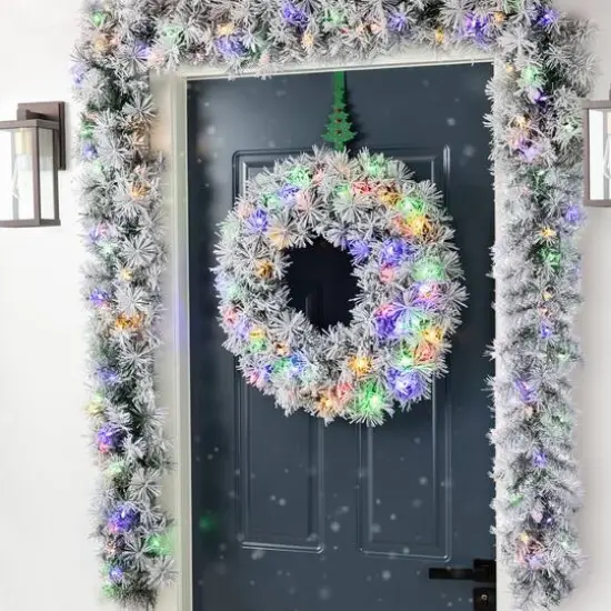 Glitzhome&reg; 9ft Pre-Lit Snow Flocked Greenery Pine Christmas Garland with Timer {5}