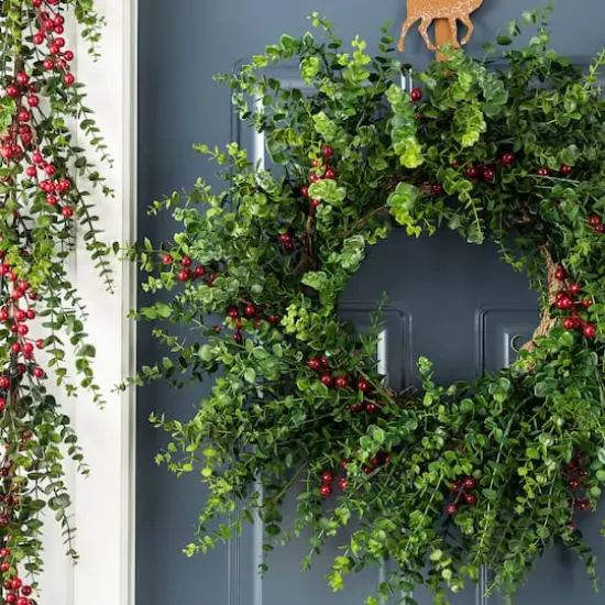 Glitzhome&reg; 28"D Christmas Greenery PE Eucalyptus Wreath with Red Berries {5}