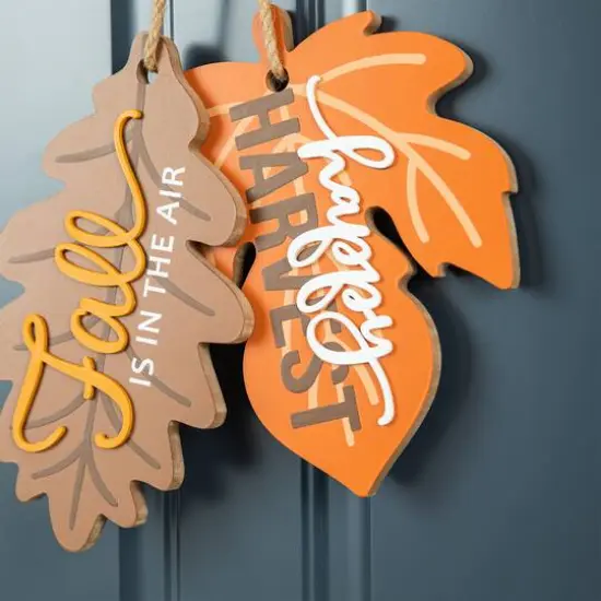 Glitzhome&reg; 24.5" Fall Wood Maple Leaves with Bowknot Door Hanger {6}