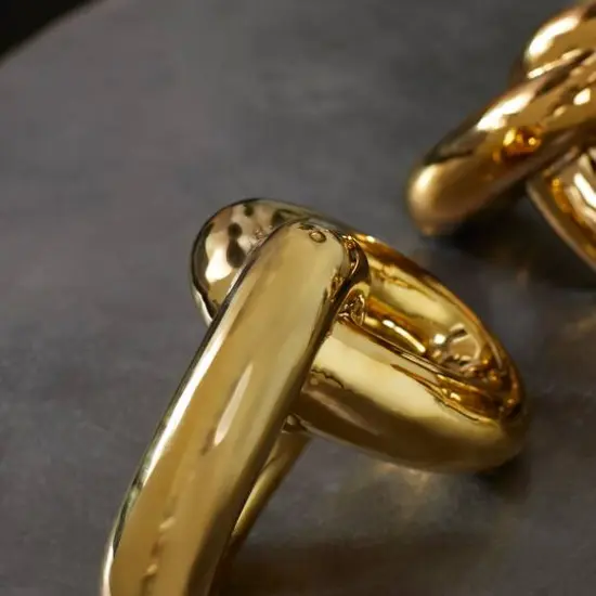 CosmoLiving by Cosmopolitan Gold Porcelain Glam Chain Sculpture Set {7}