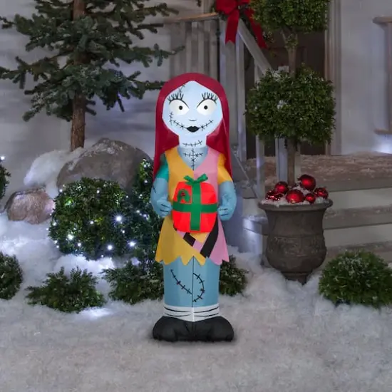 3.5ft. Airblown&reg; Inflatable Christmas Sally with Gift Box {4}