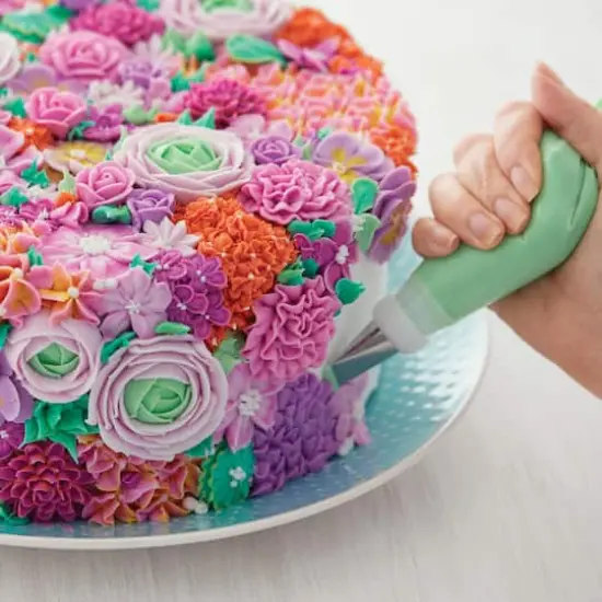 Wilton&trade; 55-Piece Master Cake & Cupcake Piping Tip Set {4}