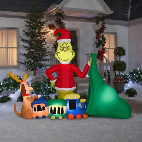 6.5ft. Airblown&reg; Inflatable Christmas Grinch Putting Train in Santa Sack {5}