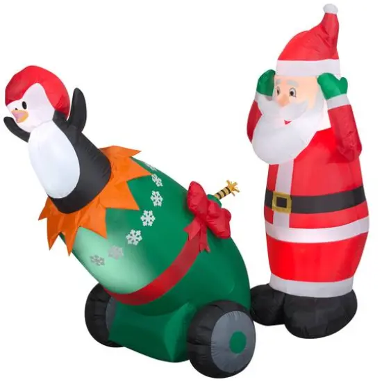5.5ft. Lightshow Airblown® Inflatable Christmas Santa & Penguin Cannon Scene with Sparkle {1}