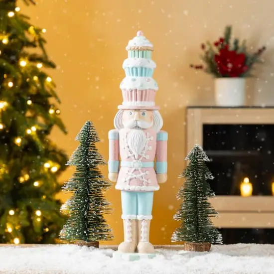 Glitzhome&reg; 18.25" Resin Christmas Cupcake Nutcracker Table Decor {4}