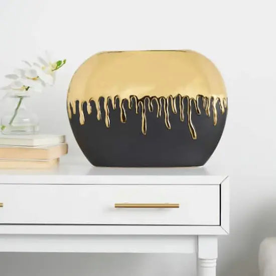 CosmoLiving by Cosmopolitan 11" Black Ceramic Vase with Abstract Gold Melting Drips {1}