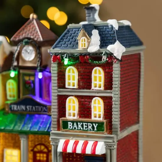 Glitzhome&reg; 13.75" Lighted Christmas Train station Resin Village with Movement and Music {6}