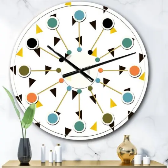 Designart 'Trendy Black And Gold Triangular Pattern Mid-Century Modern Wall Clock {1}