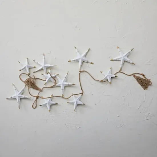 Hello Honey&reg; 6ft. White Hand-Painted Recycled Paper Mache Stars with Gold Foil & Tassels Garland {3}