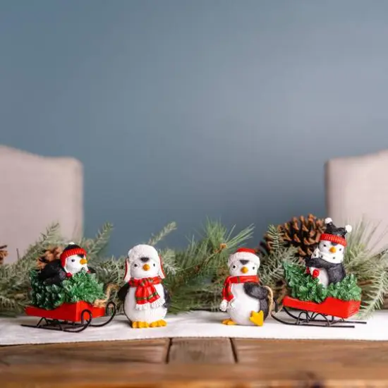 Playful Penguins with Sled Figurine Set {5}