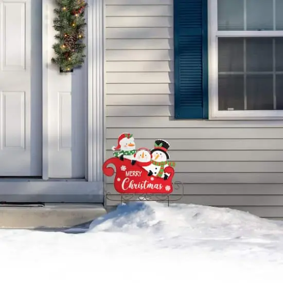Glitzhome&reg; 24" Metal Snowmen Riding Sleigh Yard Stake {4}