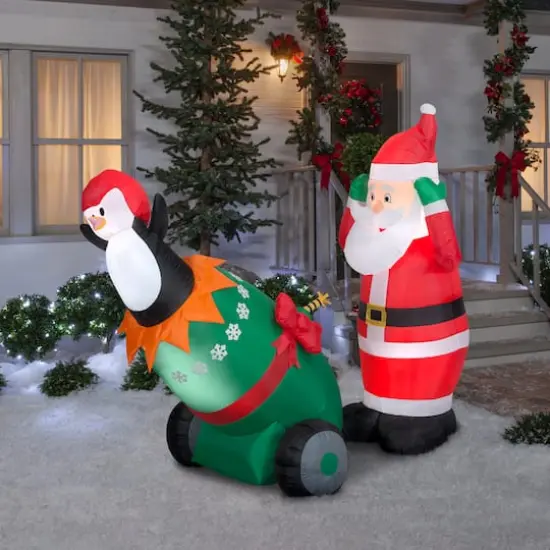 5.5ft. Lightshow Airblown® Inflatable Christmas Santa & Penguin Cannon Scene with Sparkle {3}