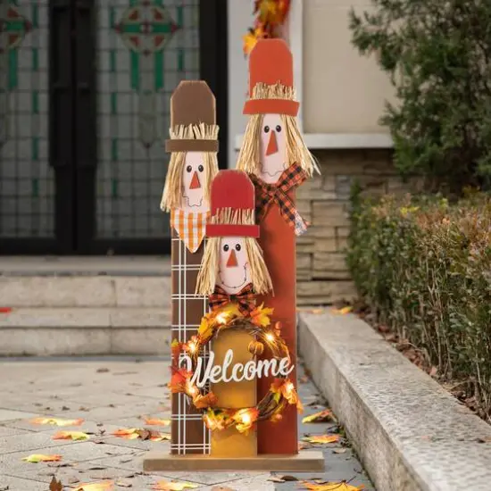 Glitzhome&reg; 36.25" Wooden Scarecrow Family Porch D&eacute;cor with Lighted Wreath & Timer {11}