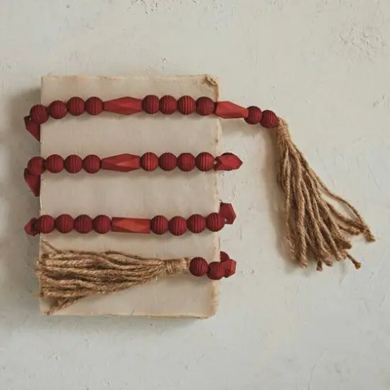 Hello Honey® 6ft. Burgundy Paulownia Wood Beads & Jute Tassels Garland {4}