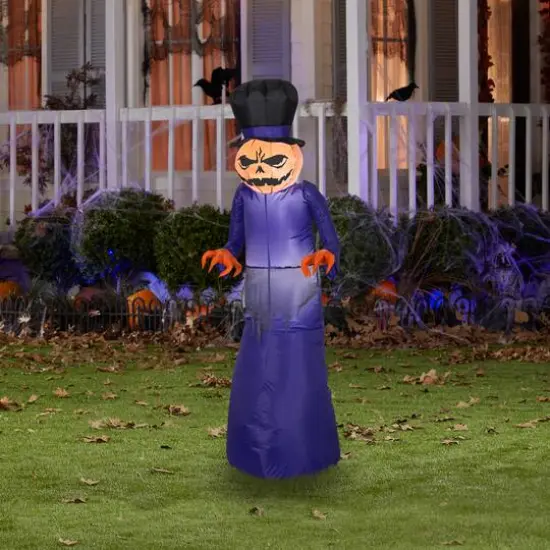 5ft. Airblown&reg; Inflatable Halloween Pumpkin Reaper with Top Hat {3}