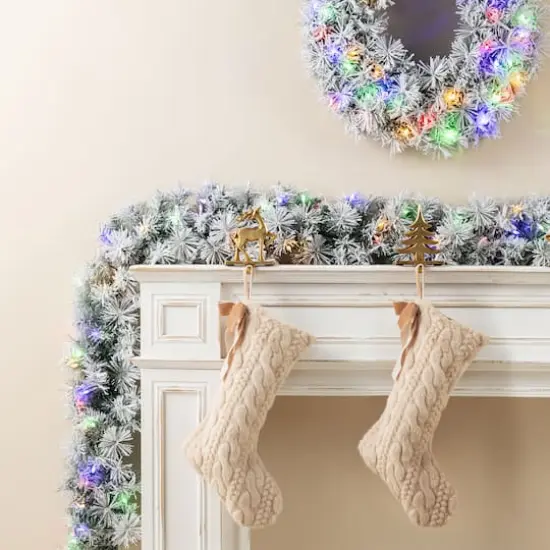 Glitzhome&reg; 9ft Pre-Lit Snow Flocked Greenery Pine Christmas Garland with Timer {4}