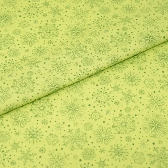 SINGER Christmas Snowflakes on Green Cotton Fabric {1}