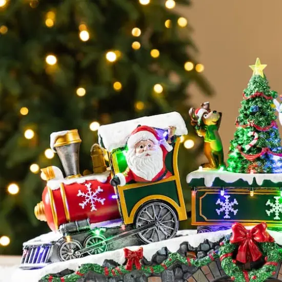 Glitzhome&reg; 20" Lighted Christmas Santa Train Resin Village with Movement and Music {5}
