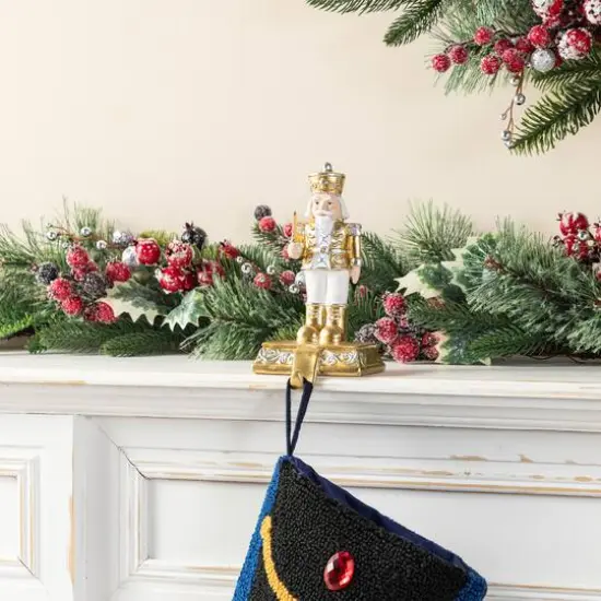 Glitzhome&reg; Christmas Resin Nutcracker Stocking Holder Set {4}