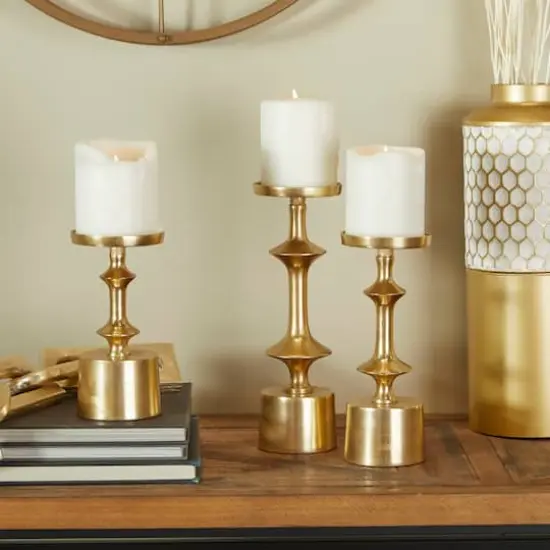CosmoLiving by Cosmopolitan Gold Aluminum Pillar Candle Holder Set {8}