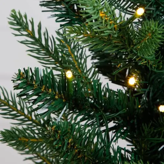 2ft. Pre-Lit Artificial Classic Christmas Tree with 35 Warm White LED Lights in Gold Decorative Planter {7}