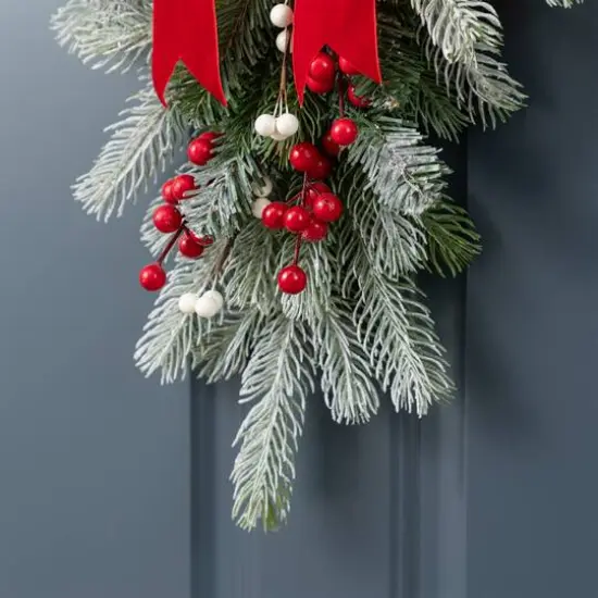 Glitzhome&reg; 25" Greenery Snowman Door Hanger {7}