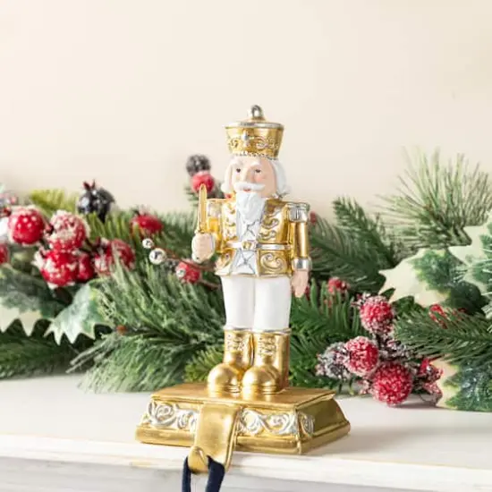 Glitzhome&reg; Christmas Resin Nutcracker Stocking Holder Set {5}