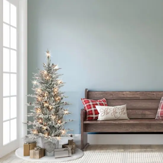 4.5ft. Pre-Lit Flocked Artificial Christmas Tree in Metal Planter, Clear Lights {4}