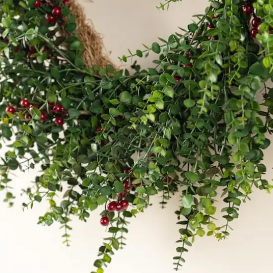 Glitzhome&reg; 28"D Christmas Greenery PE Eucalyptus Wreath with Red Berries {6}