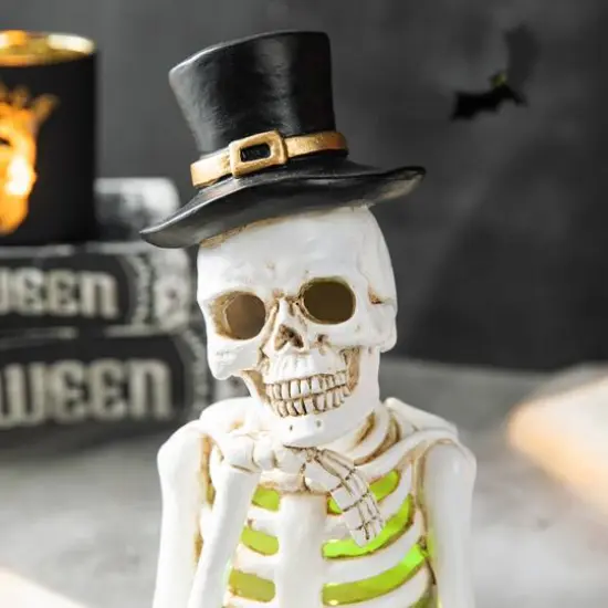 Glitzhome&reg; 10" Lighted Halloween Resin Skull Reading Book Table D&eacute;cor {6}