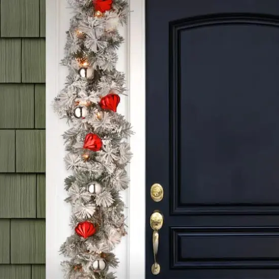 9 ft. Pre-lit Snowy Bristle Artificial Christmas Pine Garland with Red & Silver Ornaments & 70 Clear Lights {3}