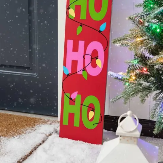 Glitzhome&reg; 4.5ft. Wooden Santa Porch Sign with Fabric Dangling Legs {8}