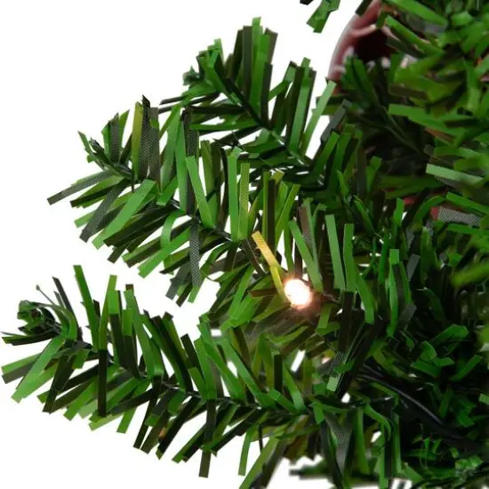 6ft. Pre-Lit Green Musical Snowing Artificial Christmas Tree, White LED Lights {3}